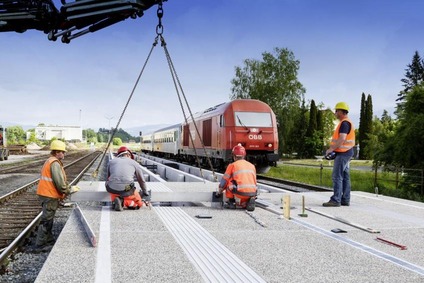 construction worker at train station