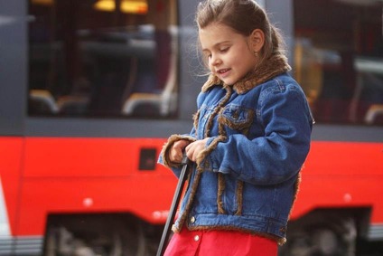 Girl at station platform.