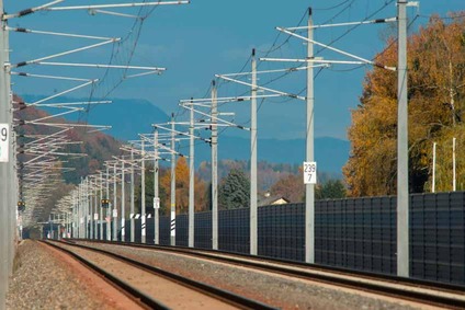 Railway track with overhead contact line