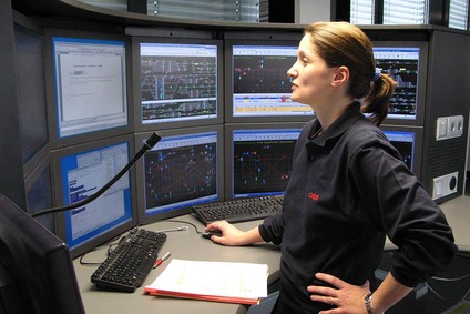 Dispatcher at work in front of monitors