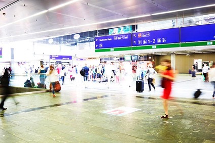 People at a train station