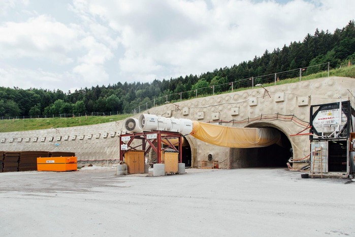 The photo shows the entrance of two tunnel tubes.
