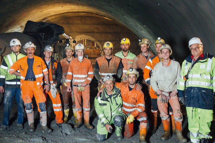 A group of miners posing for a photo.