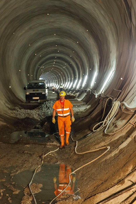 A miner walks along the tunnel.<br/>