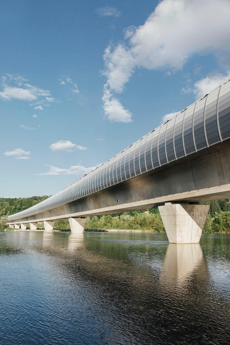 The photo shows a bridge that was built over a river.