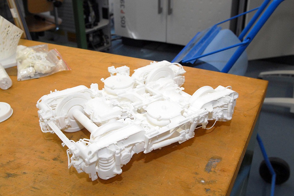 3D-Drucker produzieren heutzutage selbst äußerst komplexe Teile. Wie zum Beispiel dieses Modell eines Triebdrehgestells der Cityjet-Züge, hergestellt von der Fa. FOTEC.