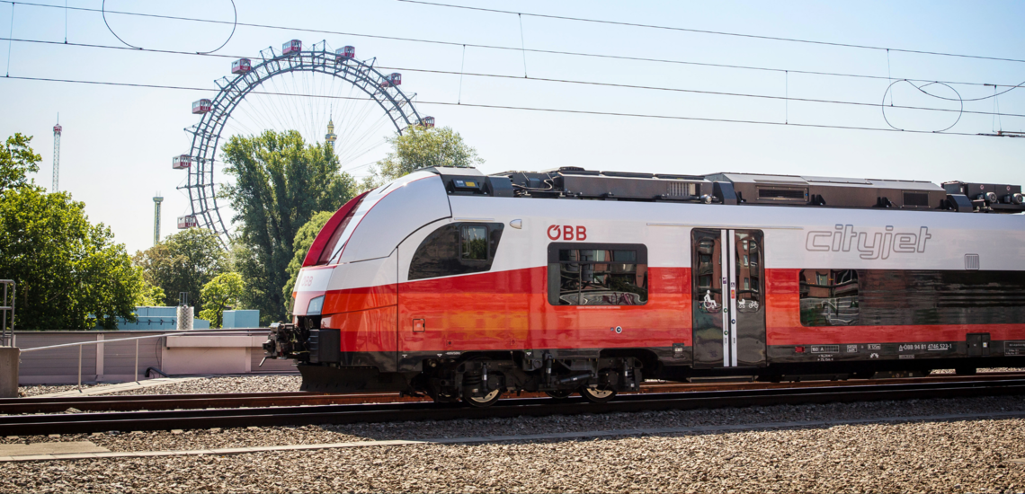 Cityjet vor Riesenrad
