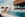 Wellness in Österreich: Frau entspannt am Poolrand der KärntenTherme in Warmbad-Villach