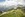 Zum Wandern bei Salzburg gehört der Stubnerkogel. Auf dem Bild sieht man Wandersleute vor einer Hütte.