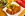 Zu den wichtigsten Wien Sehenswürdigkeiten gehört natürlich auch das Wiener Schnitzel. Auf dem Bild sieht man ein Wiener Schnitzel mit Zitronenspalte, dazu Petersilienkartoffel und einen Salat – ganz klassisch angerichtet. 