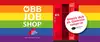Roter Spind mit Aufschrift "Hier ist dein Job frei" bei Regenbogen Hintergrund