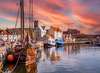 Zum Ostsee-Urlaub gehört Wismar. Auf dem Bild sieht man den Alten Hafen der Hansestadt im Abendlicht. 