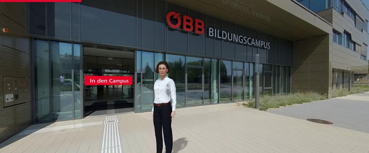 Eingang ÖBB-Bildungscampus mit Avatar Marie