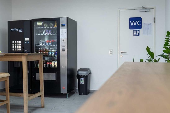 Lounge with seating and snack vending machines
