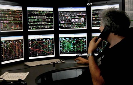 Monitors showing time-tables