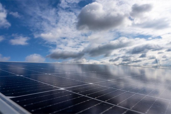 Photovoltaic system at the Vienna South freight centre with clouds