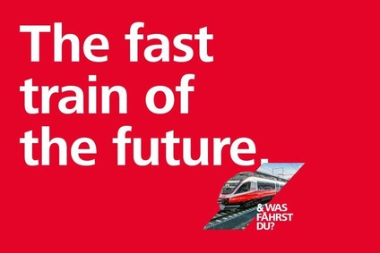 Herosujet campaign Fast train<br/>Text insert: red background, white font, blue and white icon, photo diamond with train and white font