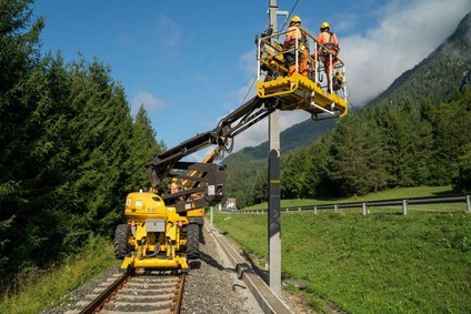 Workers are working on the overhead lines.