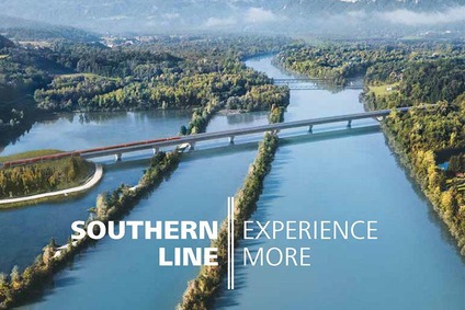Text insert: Image of Drau bridge with white text