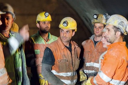 Miners inside the tunnel.