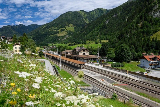 Foto Bad Hofgastein<br/>Textinsert: Landschaftsbild mit Bahnhof Bad Hofgastein