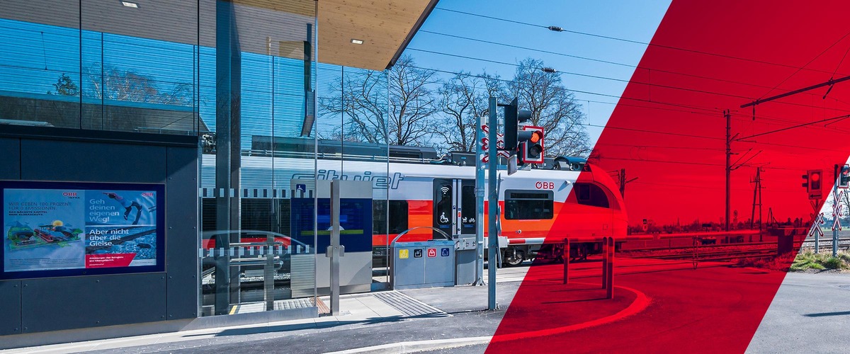 Subject: Correct behavior at railroad crossings<br/>Text insert: Regional train passes railroad crossing. The barrier is closed, the light signal is red.