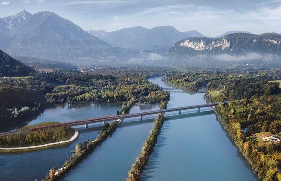 Auf diesem Foto ist ein Zug zu sehen, der die neue Drau-Brücke überquert.