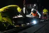 Bauarbeiter arbeiten an den Gleisen