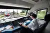 Train driver steering a train