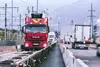 Truck loading on so-called "rolling road"