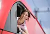 Train driver looking out of locomotive
