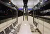 Foto Bahnsteig Feldkirch<br/>Textinsert: Nachtstimmung mit beleuchtetem Bahnsteig am Bahnhof Feldkirch