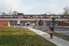 Bild Visualisierung Bad Sauerbrunn<br/>Textinsert: Bahnsteig mit Zug und Frau im Vordergrund