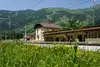 Photo: Dorfgastein train station<br/>Text insert: Train station with platform