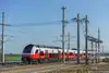Textinsert: Zug auf der Strecke Schönfeld Lassee