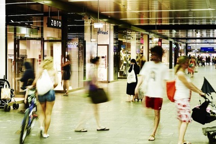 Brightly lit shops at the railway station