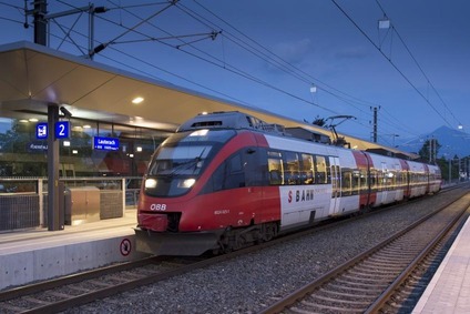 Train, stopping at the train station Lauterach