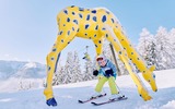 Kind auf Ski