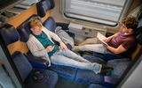 Friends relax in the seat car