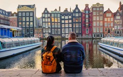 Couple at a canal in Amsterdam