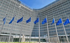 European flags fluttering in front of the Berlaymont Building