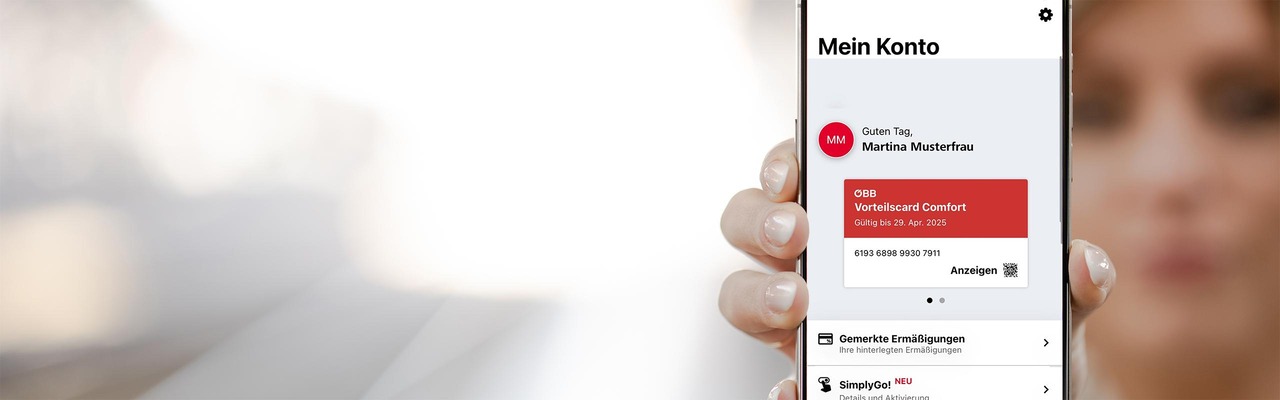 Kundin zeigt VC Comfort am Smartphone