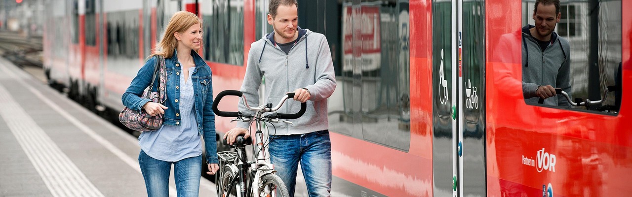 Couple on the platform with bicycles