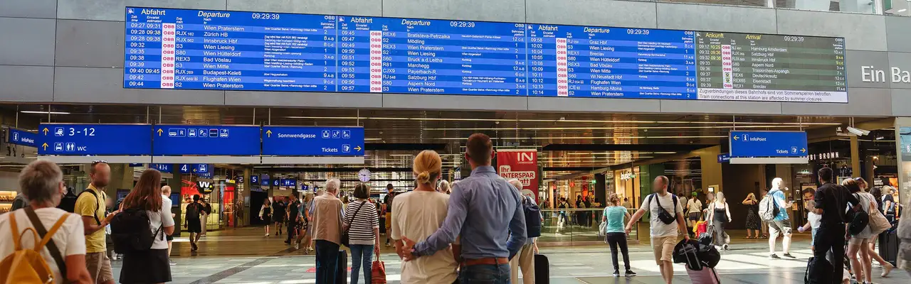 Vienna Central Station: timetable display with people