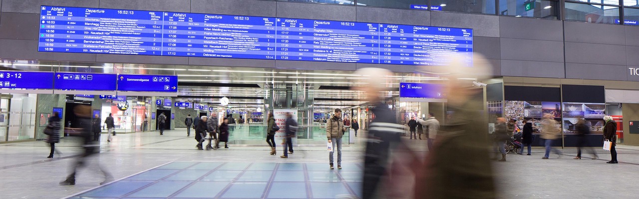 Hall of Vienna Central Station with people