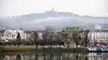 Linzer Old Town with a view from the Danube towards Pöstlingberg