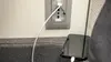 Steckdose mit Ladekabel