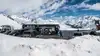 Postbus in Winterlandschaft