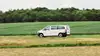 Postbus Shuttle in Landschaft
