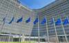 European flags fluttering in front of the Berlaymont Building
